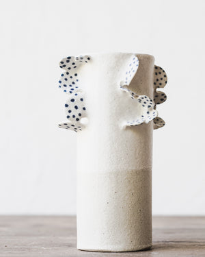 Handmade vases with scallop details and blue freckles by clay beehive ceramics
