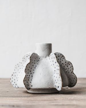 Handmade unique Anjali (angel wing) vases are sculptural and functional holding a single heavier branch stem by clay beehive ceramics