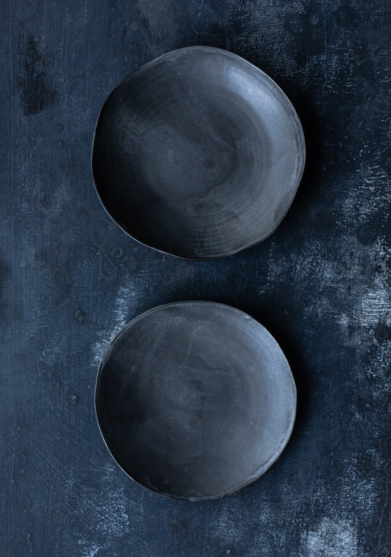 organic shaped black bowls shallow by clay beehive