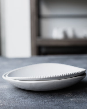 white ceramic bowls organic shaped with satin white finish by clay beehive