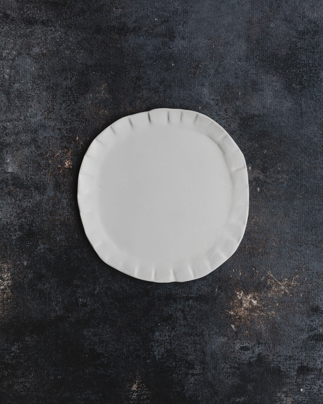 satin white pleated cake ceramic plate by clay beehive