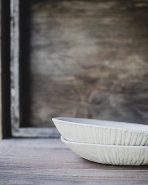 textured bowls with wide and shallow design hand made by clay beehive ceramics