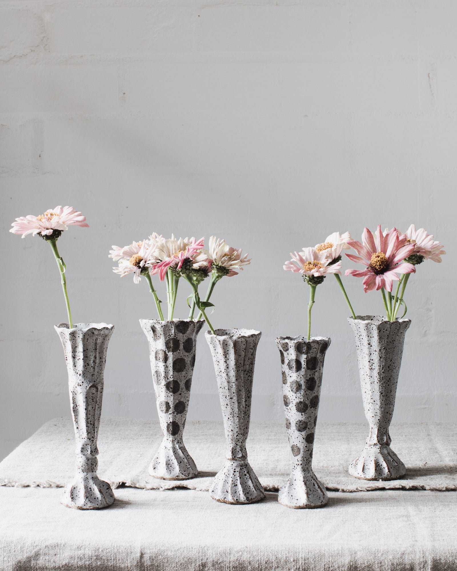 Rustic polka dot grey and white pedestal vases handmade by Clay Beehive Ceramics