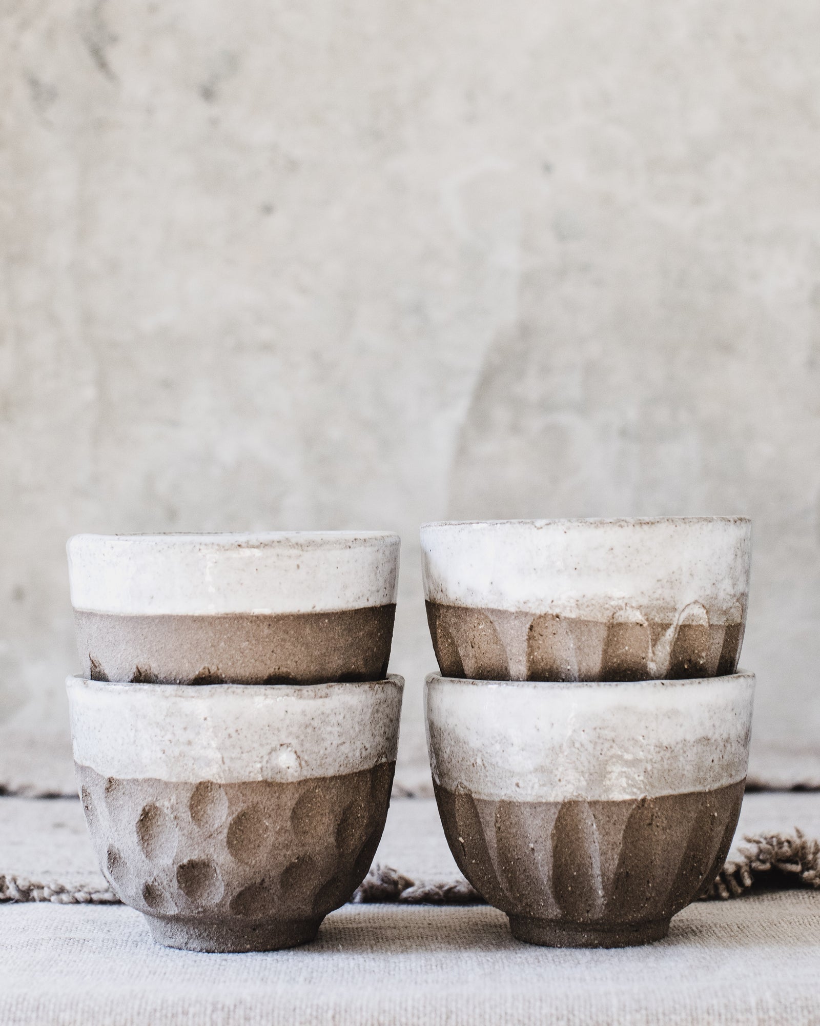 Rustic handmade ceramic footed carved cup by clay beehive ceramics