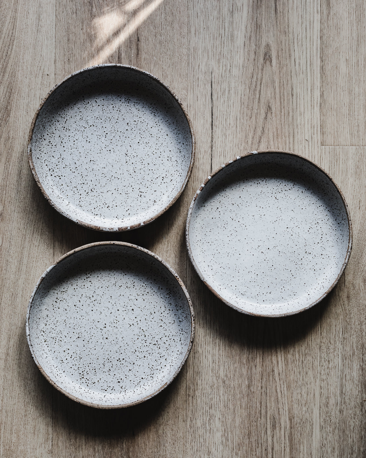 Rustic large high sided plates by clay beehive 