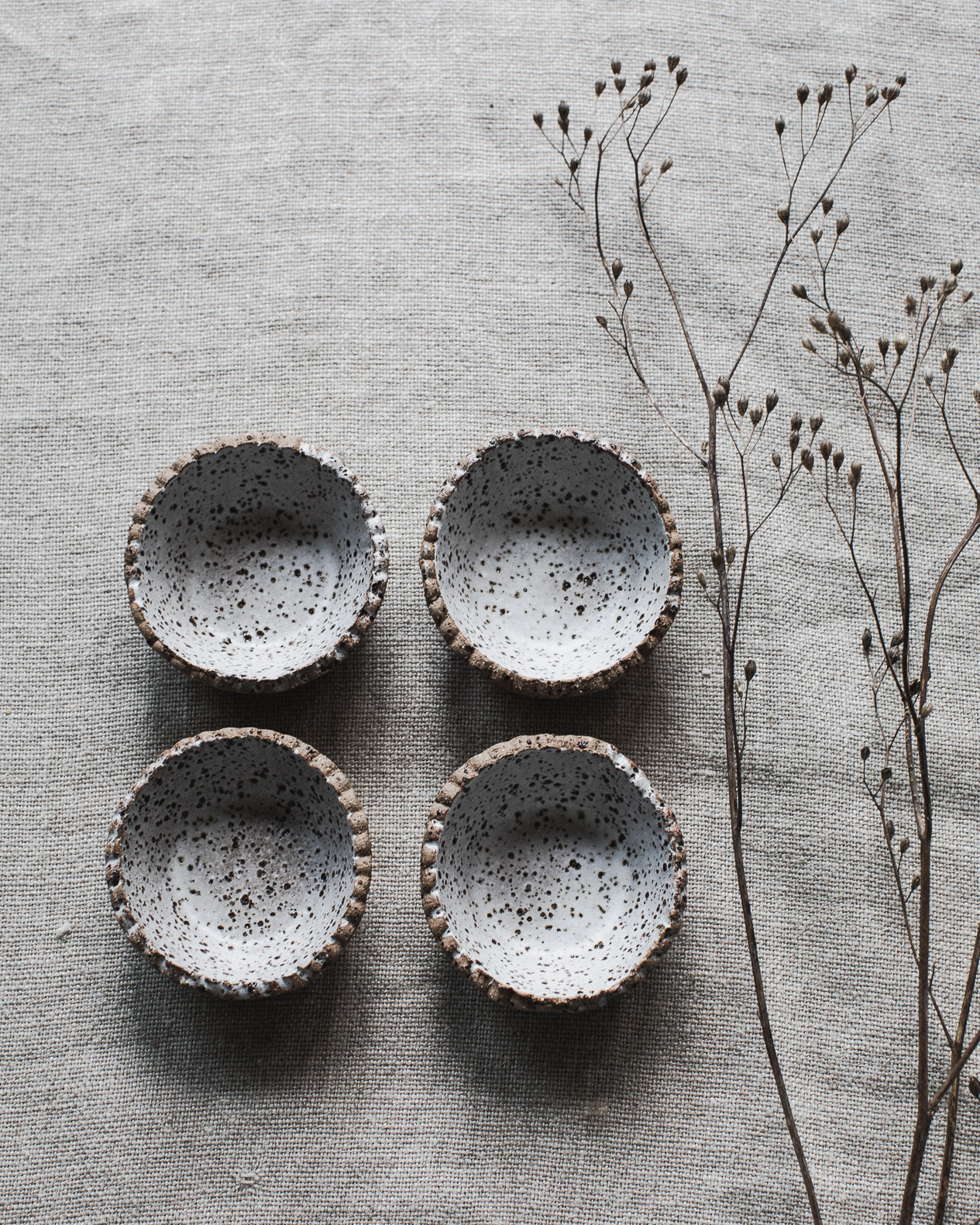 rustic salt dishes in satin white speckled finish handmade by clay beehive ceramics