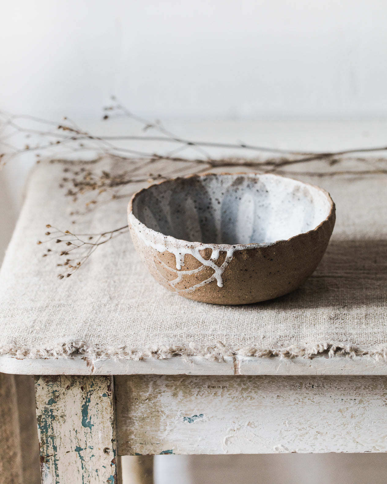 Rustic drippy glaze flower patterned bowl handmade by clay beehive ceramics 