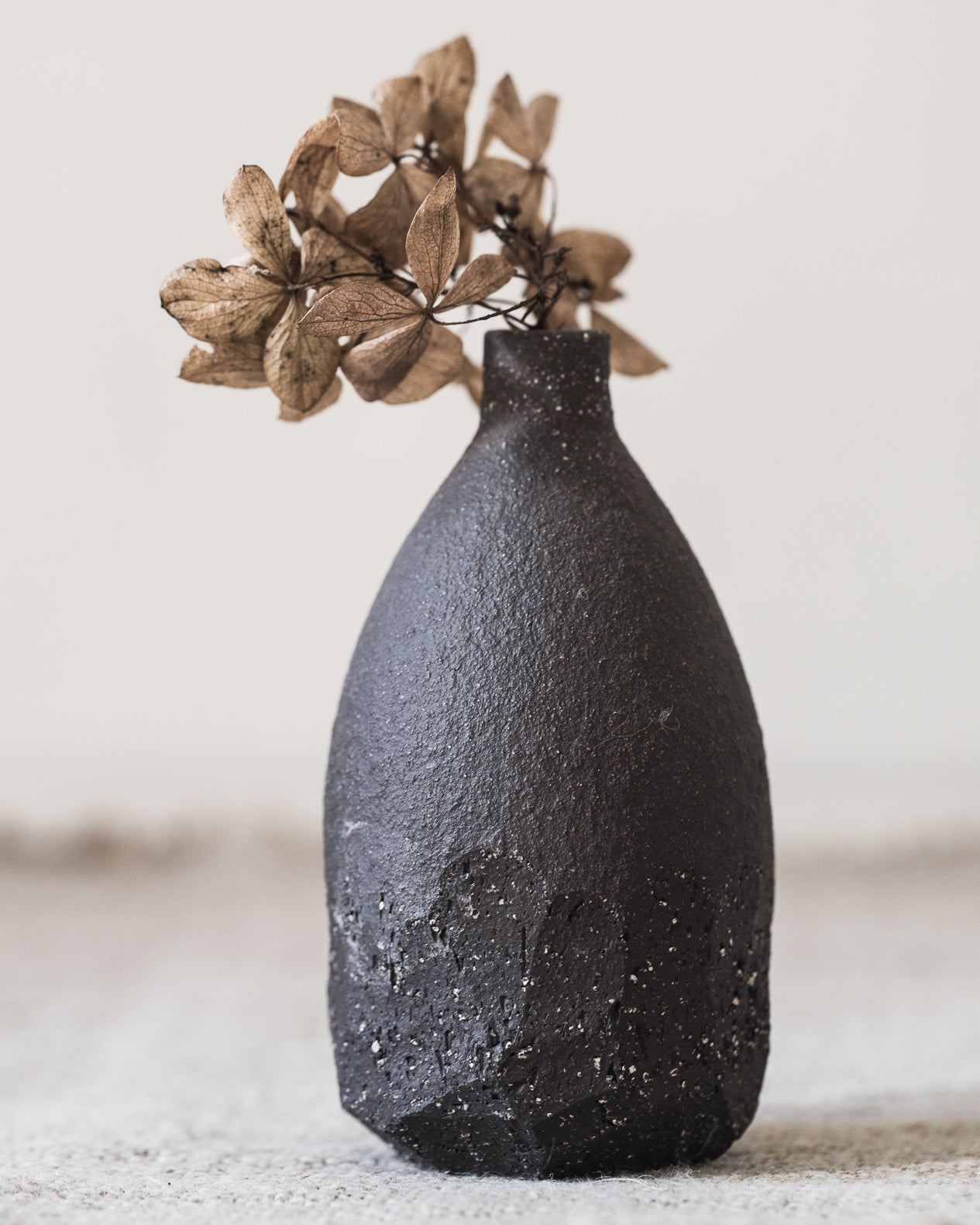 matte charcoal wabi sabi bud vase handcrafted by clay beehive ceramics