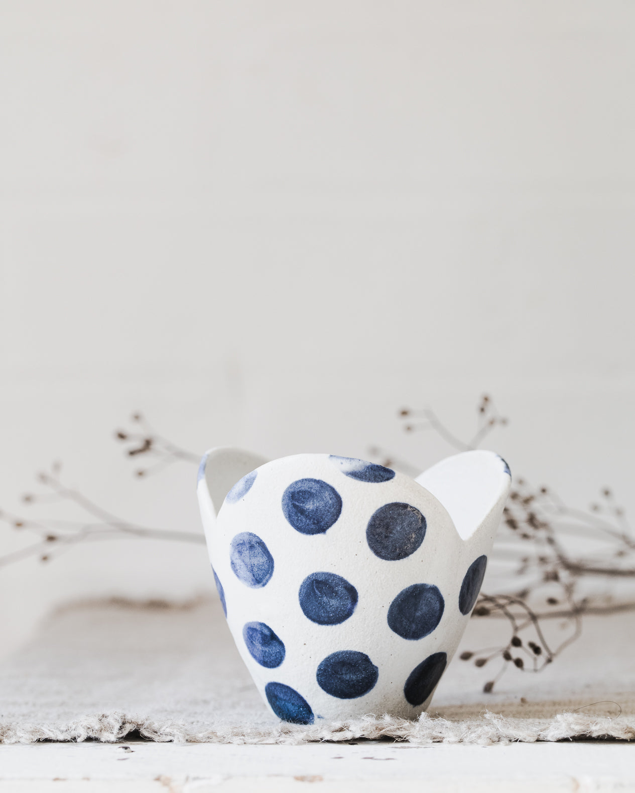 Tulip Shaped bowl decorated in blue patterns handmade by clay beehive ceramics 