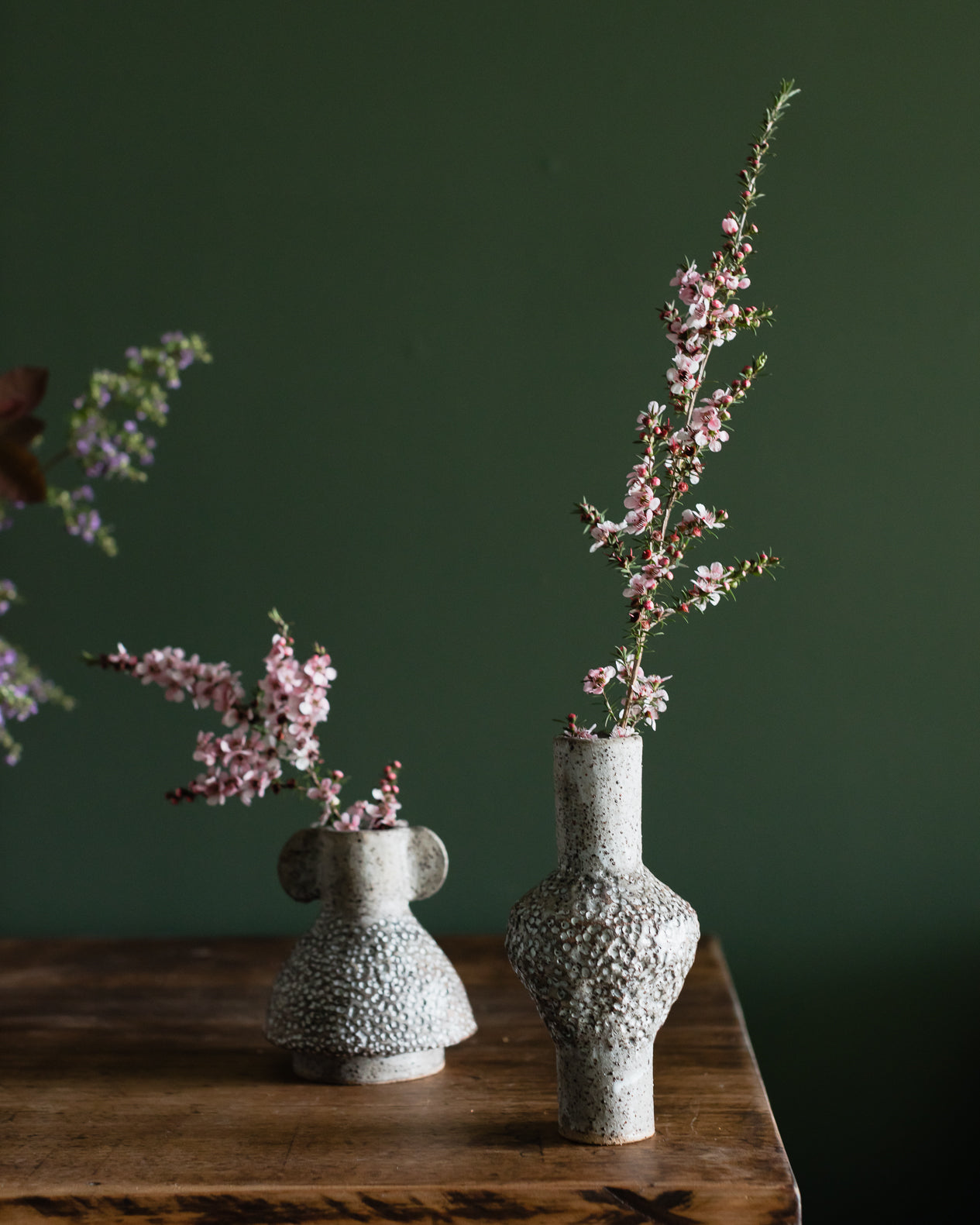Textured grey and white speckled bud vases