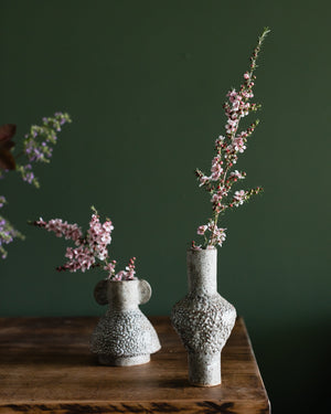 Textured grey and white speckled bud vases
