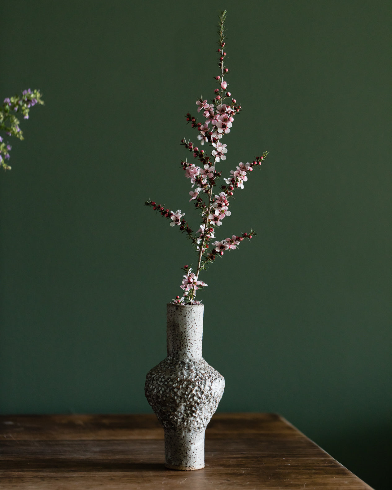 Textured grey and white speckled bud vases