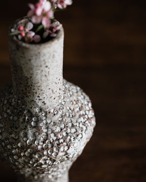 Textured grey and white speckled bud vases