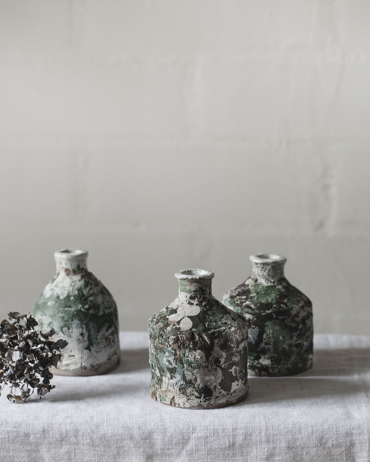 Small bud vases with worn paint patina decoration, handmade by clay beehive ceramics