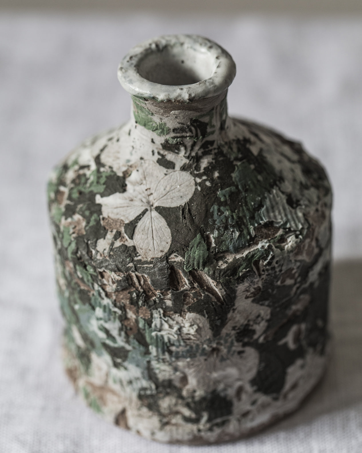 Small bud vases with worn paint patina decoration, handmade by clay beehive ceramics