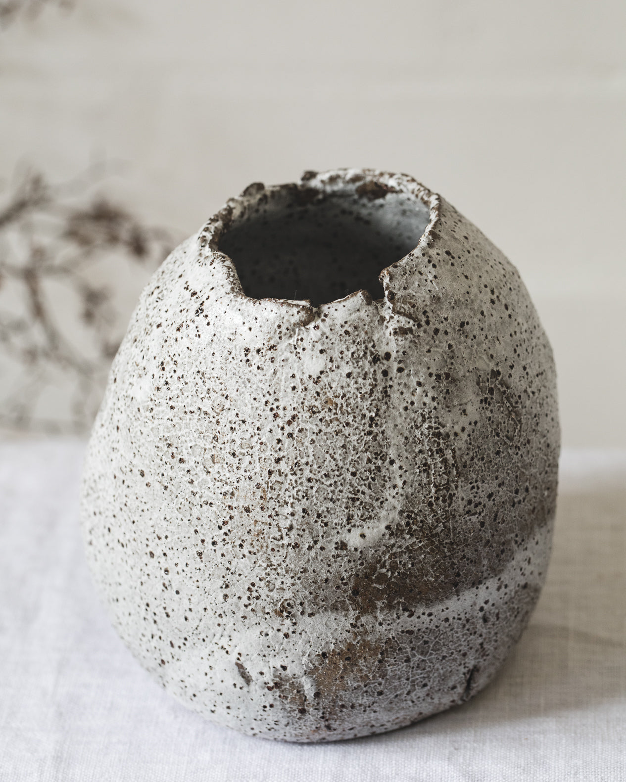 wabi sabi vase with crackled textured and speckled exterior handmade by clay beehive ceramics