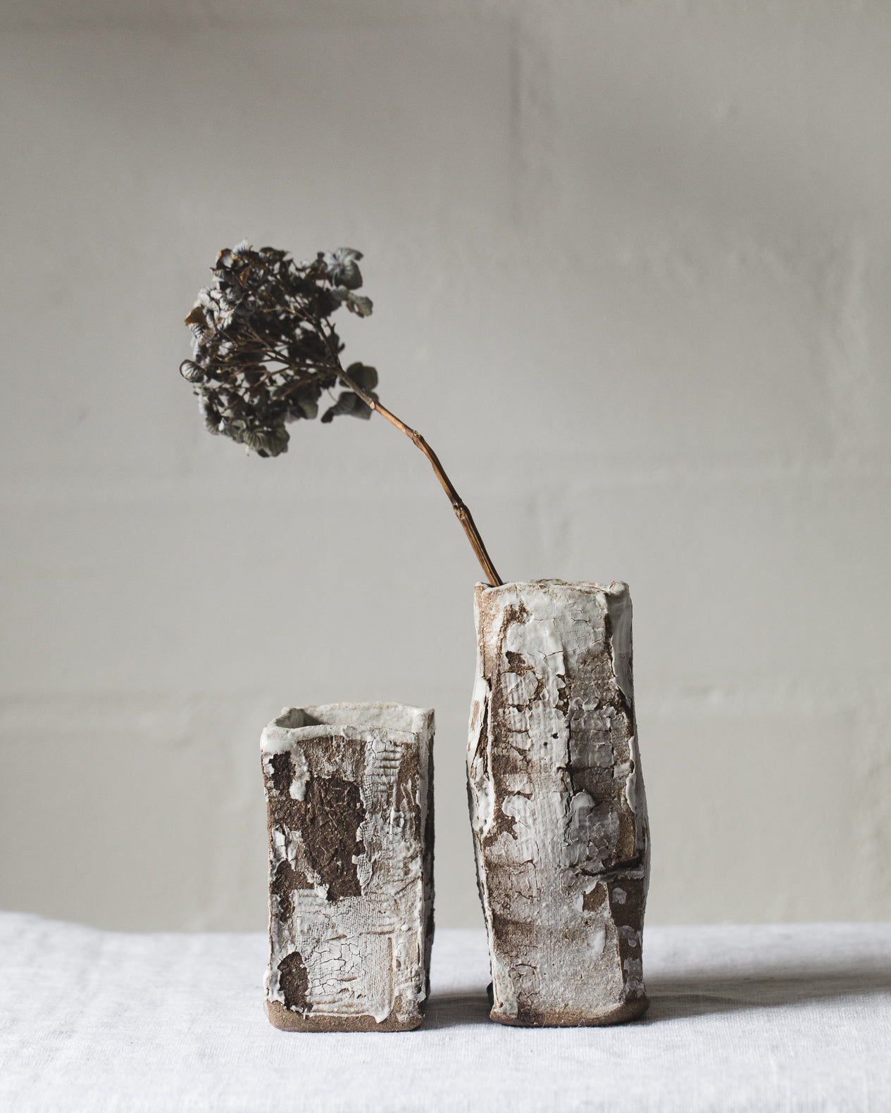 wabi sabi rustic vases with chippy old world finish, handcrafted by clay beehive ceramics 