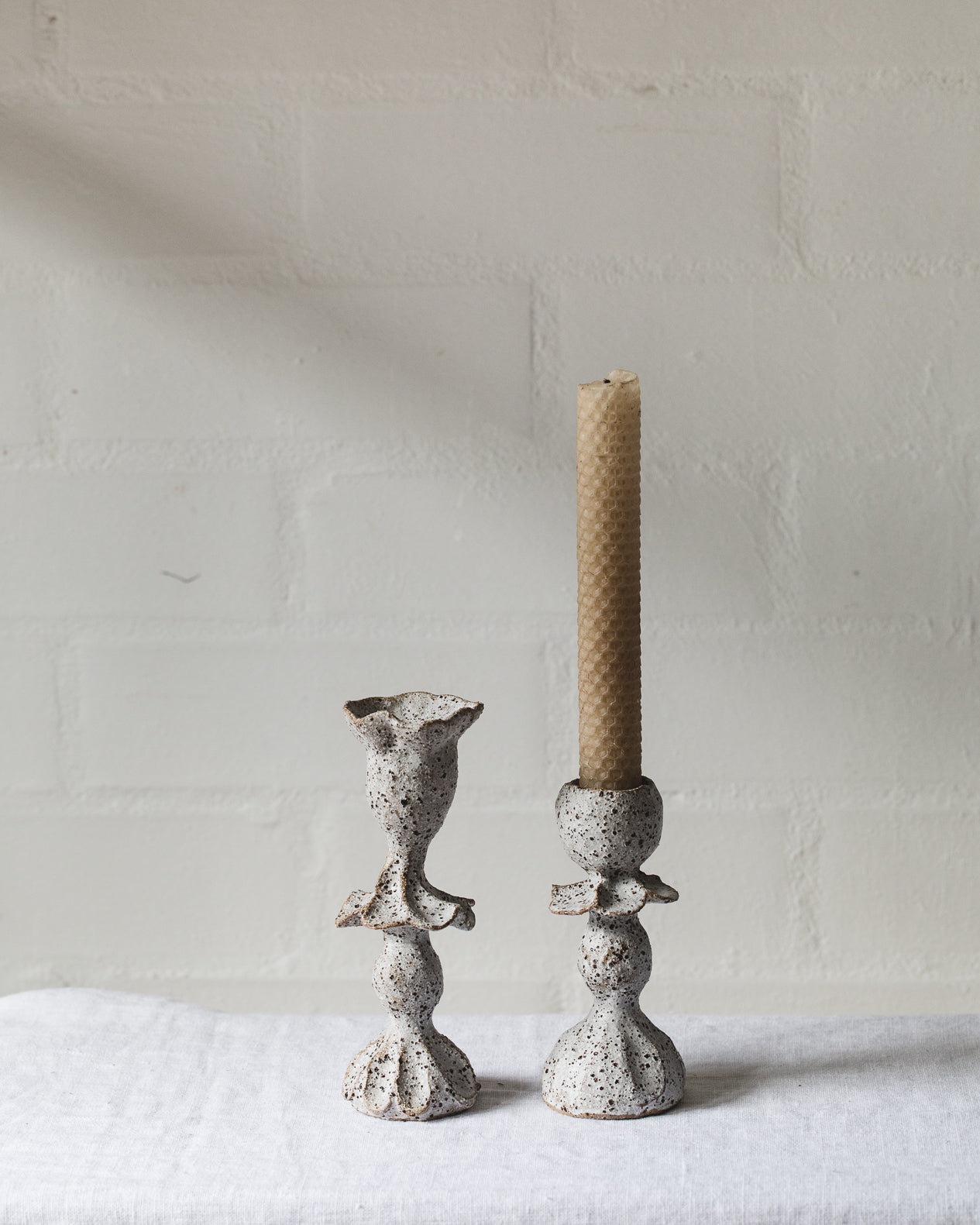 handmade white candlestick holders by clay beehive ceramics