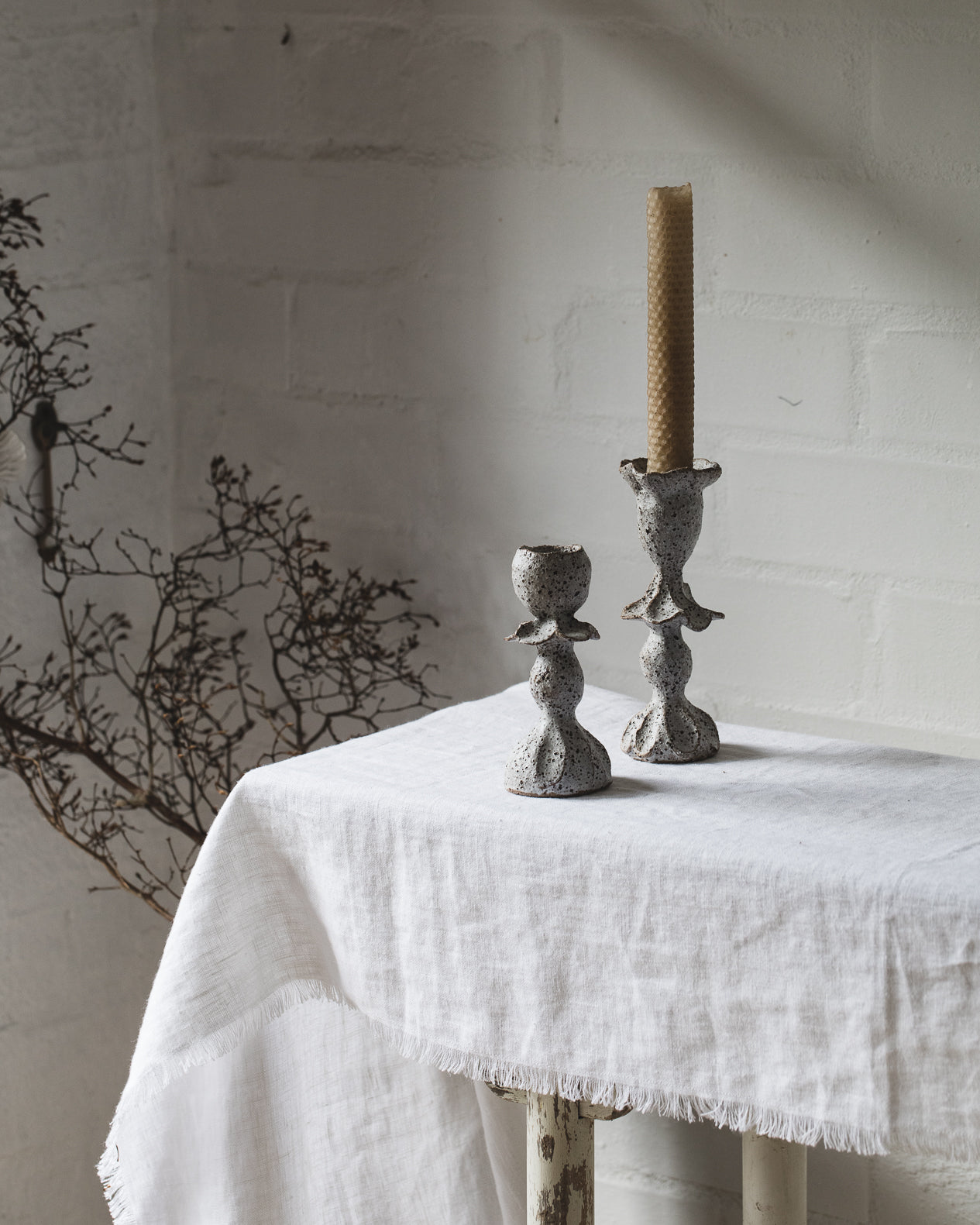 handmade white candlestick holders by clay beehive ceramics