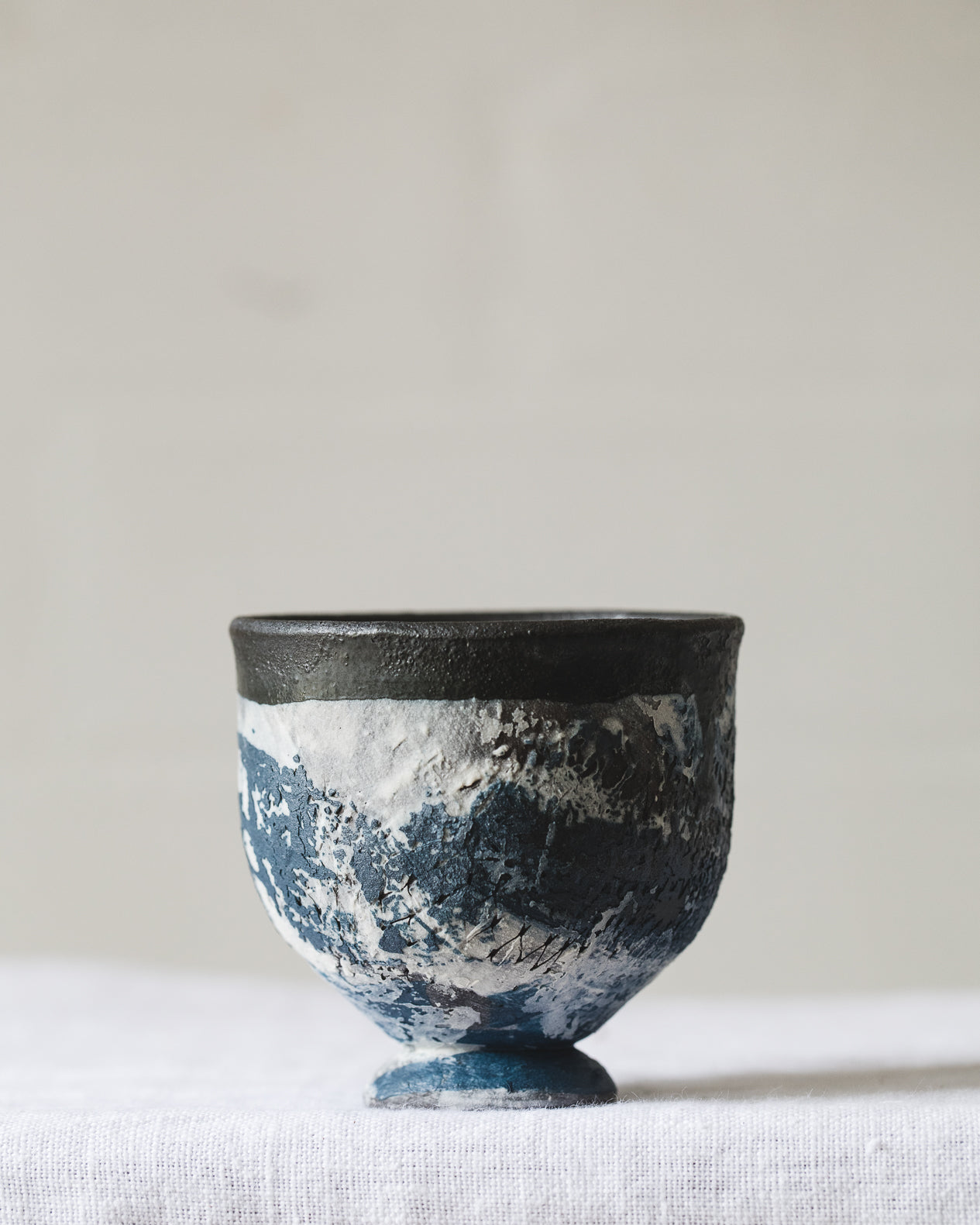 Footed goblet cups with chippy paint patina hand crafted by clay beehive ceramics