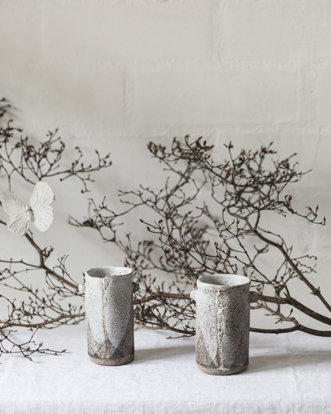 crackled effect handled rustic bud vases by clay beehive ceramics