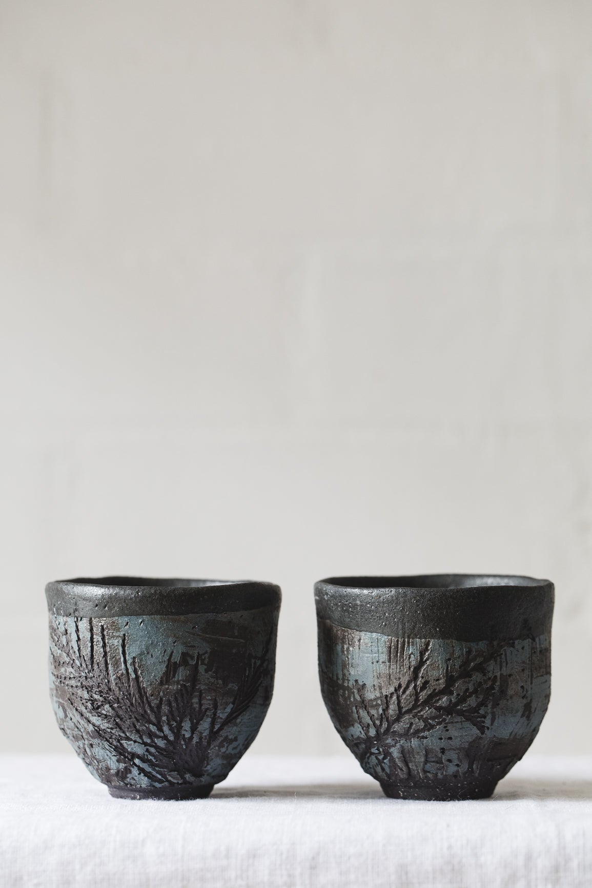 Handmade ceramic pine needle tumblers by clay beehive ceramics 