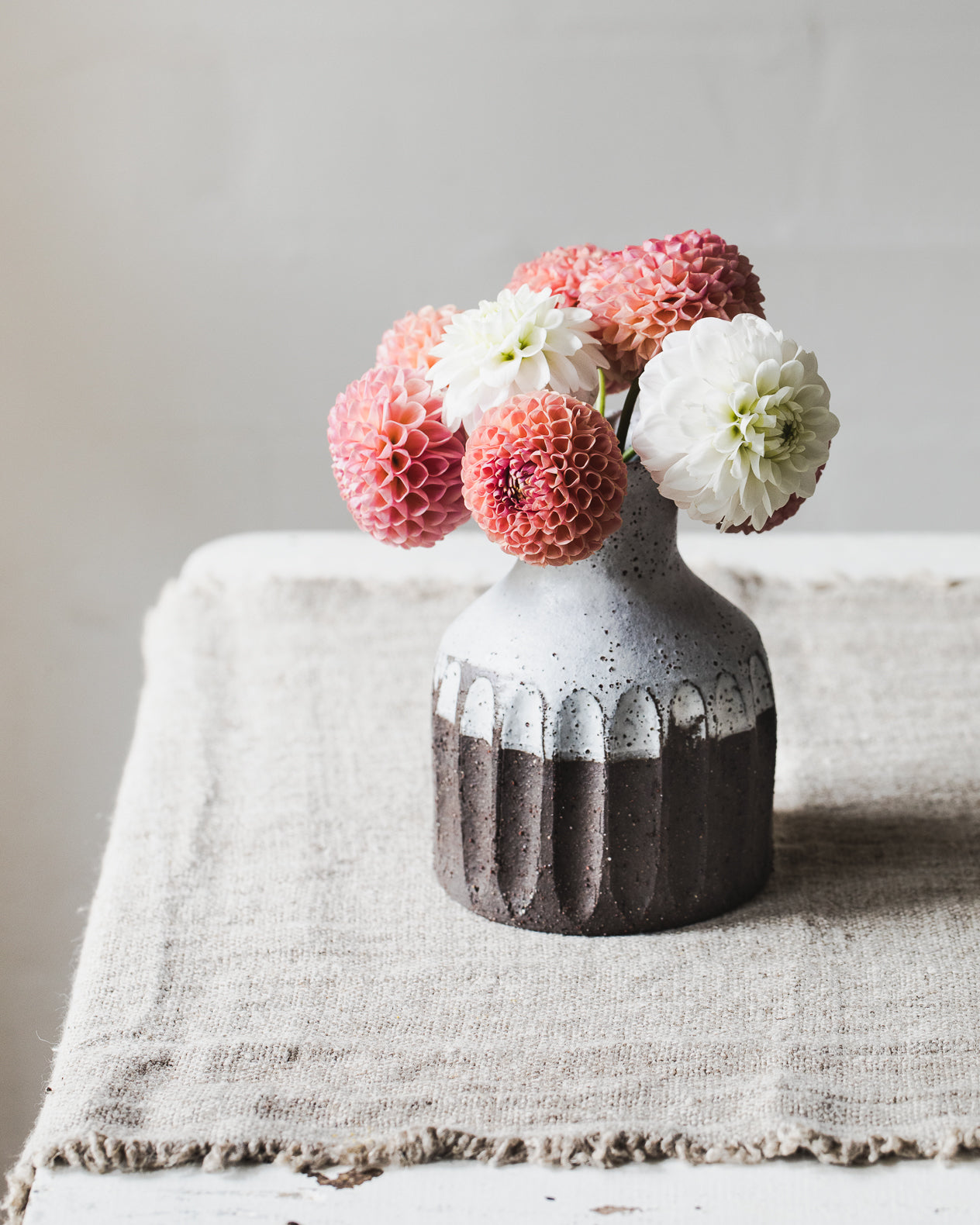 Handmade rustic chocolate earthy fluted bottle neck vase by clay beehive ceramics.