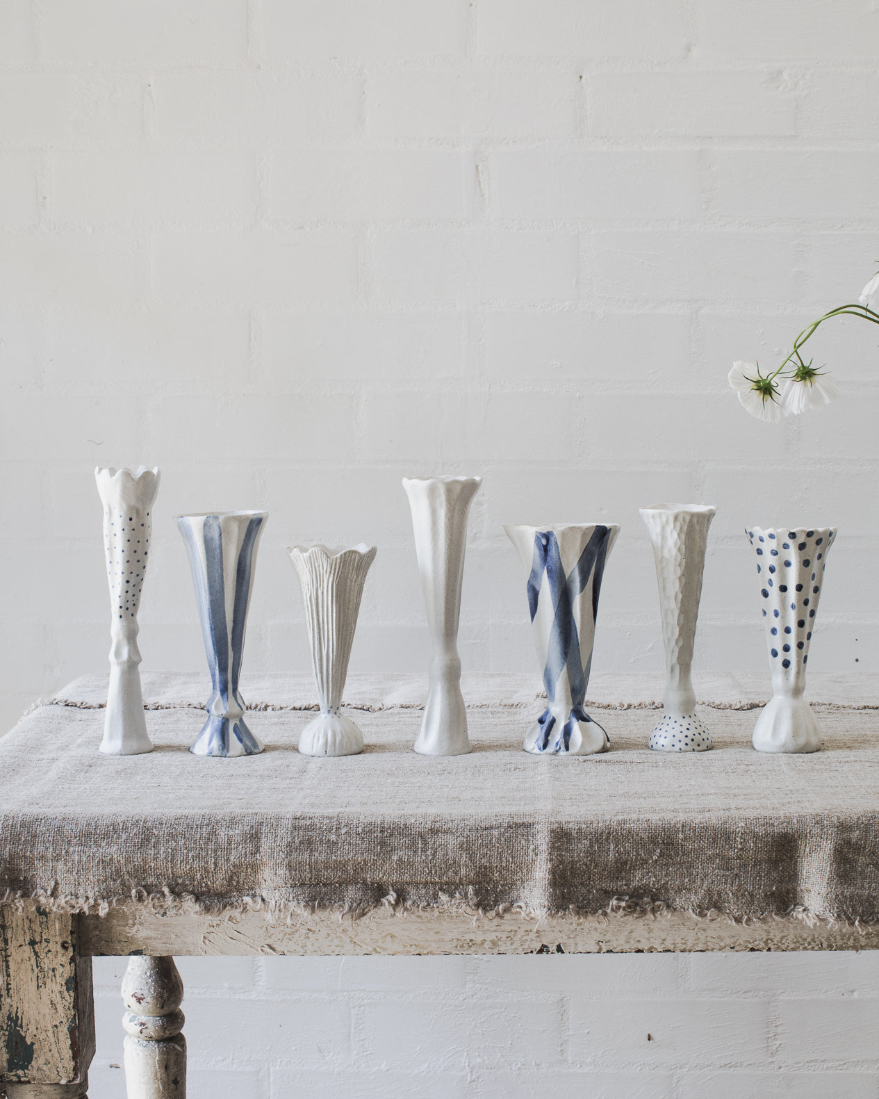 Blue and white glazed ceramic pedestal bud / posy vases handmade by clay beehive ceramics 