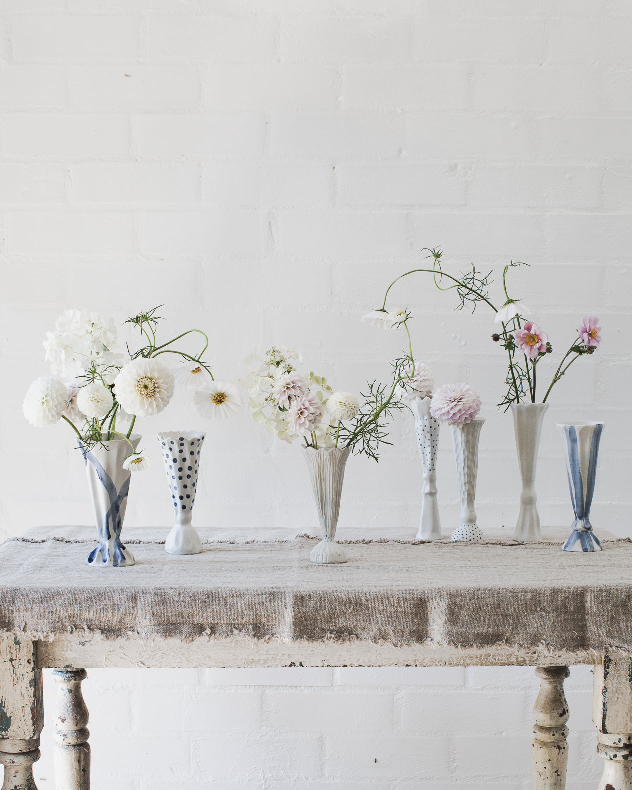 Blue and white glazed ceramic pedestal bud / posy vases handmade by clay beehive ceramics 
