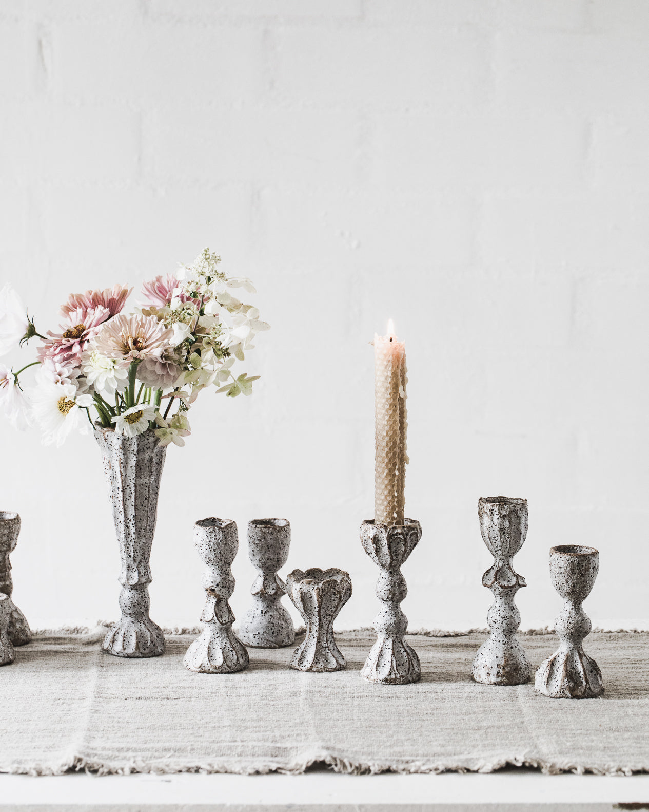 Rustic white speckled ceramic candlesticks handmade from clay beehive 