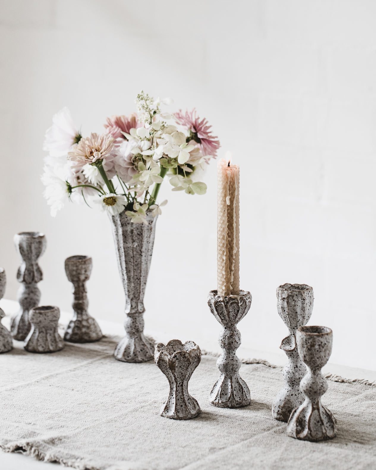 Rustic white speckled ceramic candlesticks handmade from clay beehive 