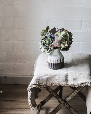 Handmade rustic chocolate earthy fluted bottle neck vase by clay beehive ceramics.