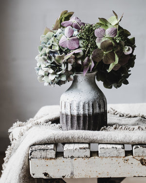 Handmade rustic chocolate earthy fluted bottle neck vase by clay beehive ceramics.