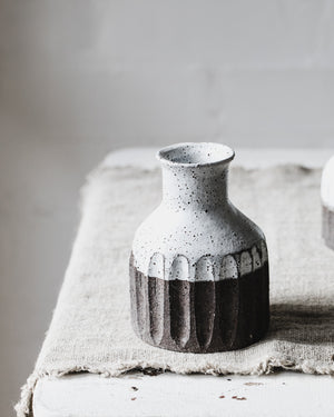 Handmade rustic chocolate earthy fluted bottle neck vase by clay beehive ceramics.