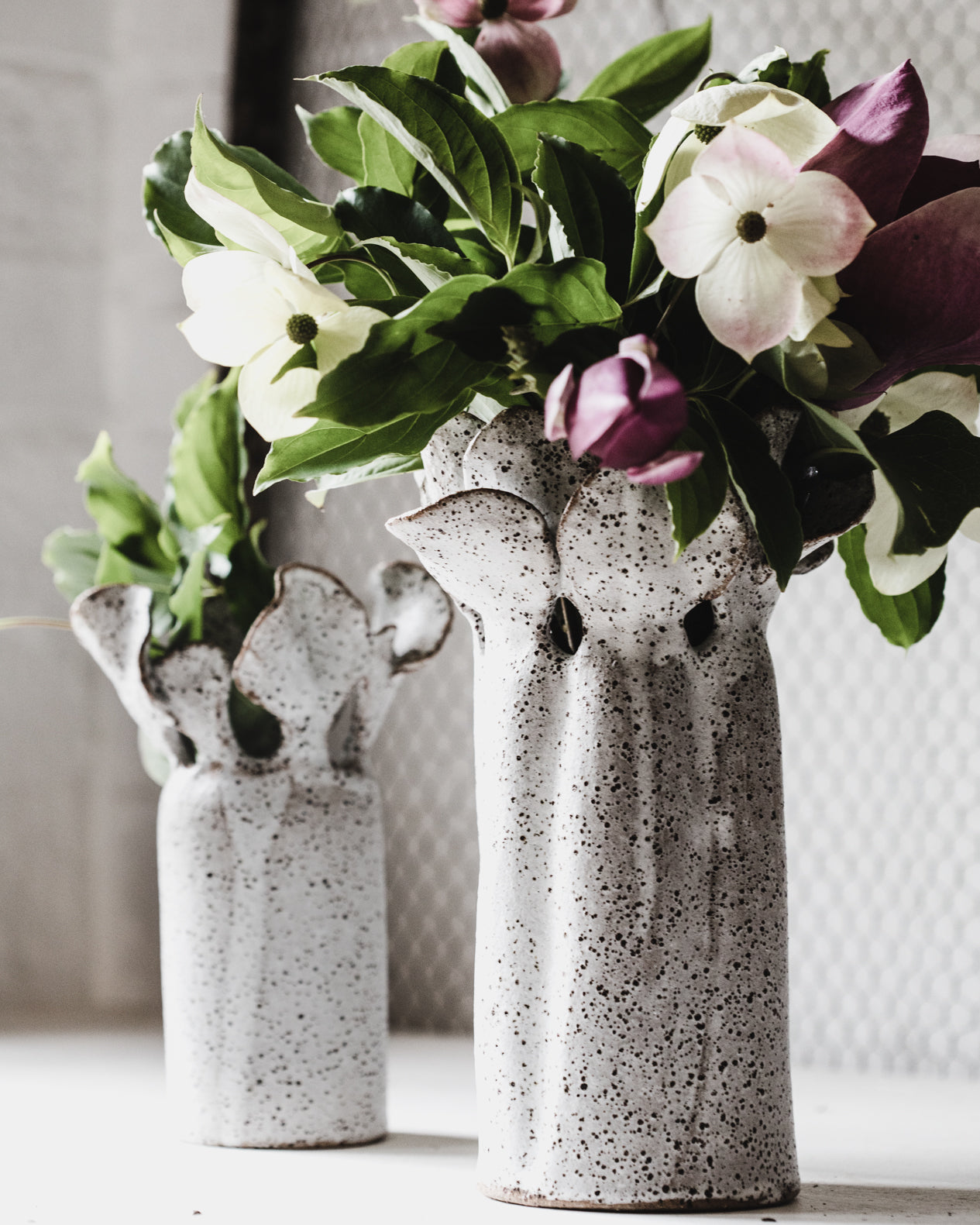 Rustic white floating petal vases handcrafted by clay beehive ceramics
