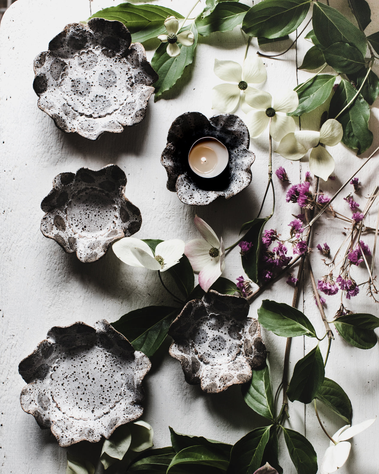 Rustic speckled spot tea light holder / small snack plate with flower shaped design by clay beehive ceramics