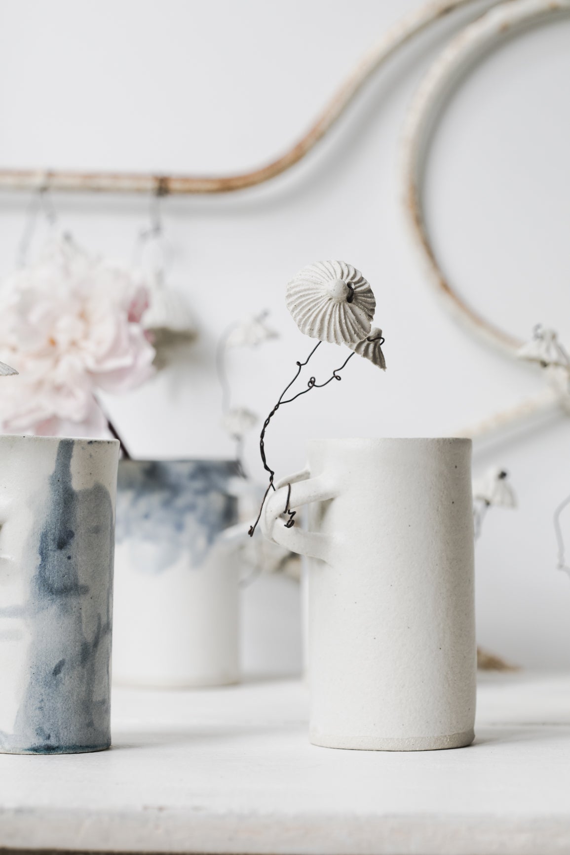 Ceramic flower vases with wire ceramic flowers in blue and white by clay beehive ceramics