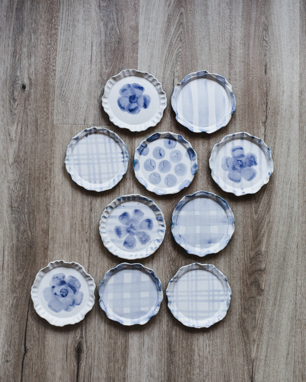 Handmade ceramic plates with frilly rims by clay beehive ceramics