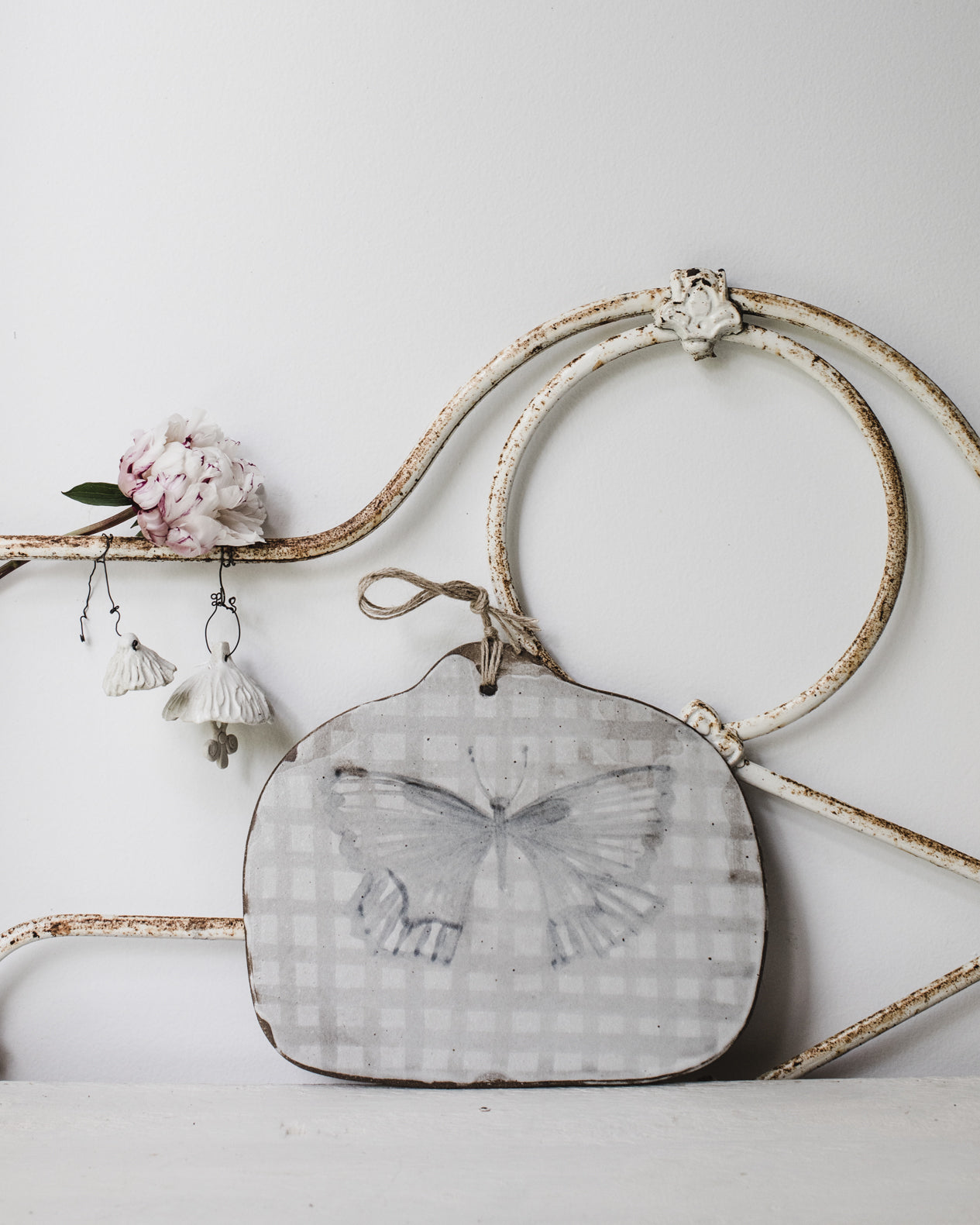 Butterfly cheeseboard with jute cord attached hand crafted by clay beehive ceramics