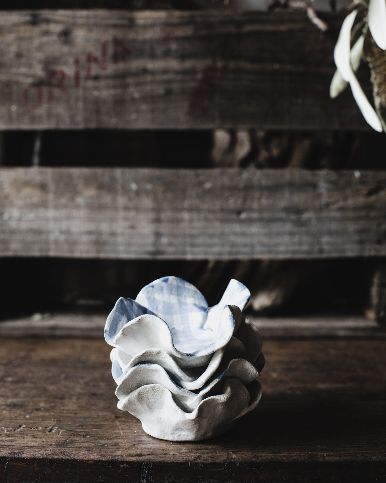 Flower shaped candle holders with spots and gingham patterns handmade by clay beehive ceramics