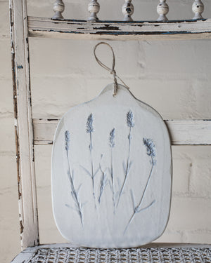Lavender impressed cheeseboard painted blue by clay beehive ceramics