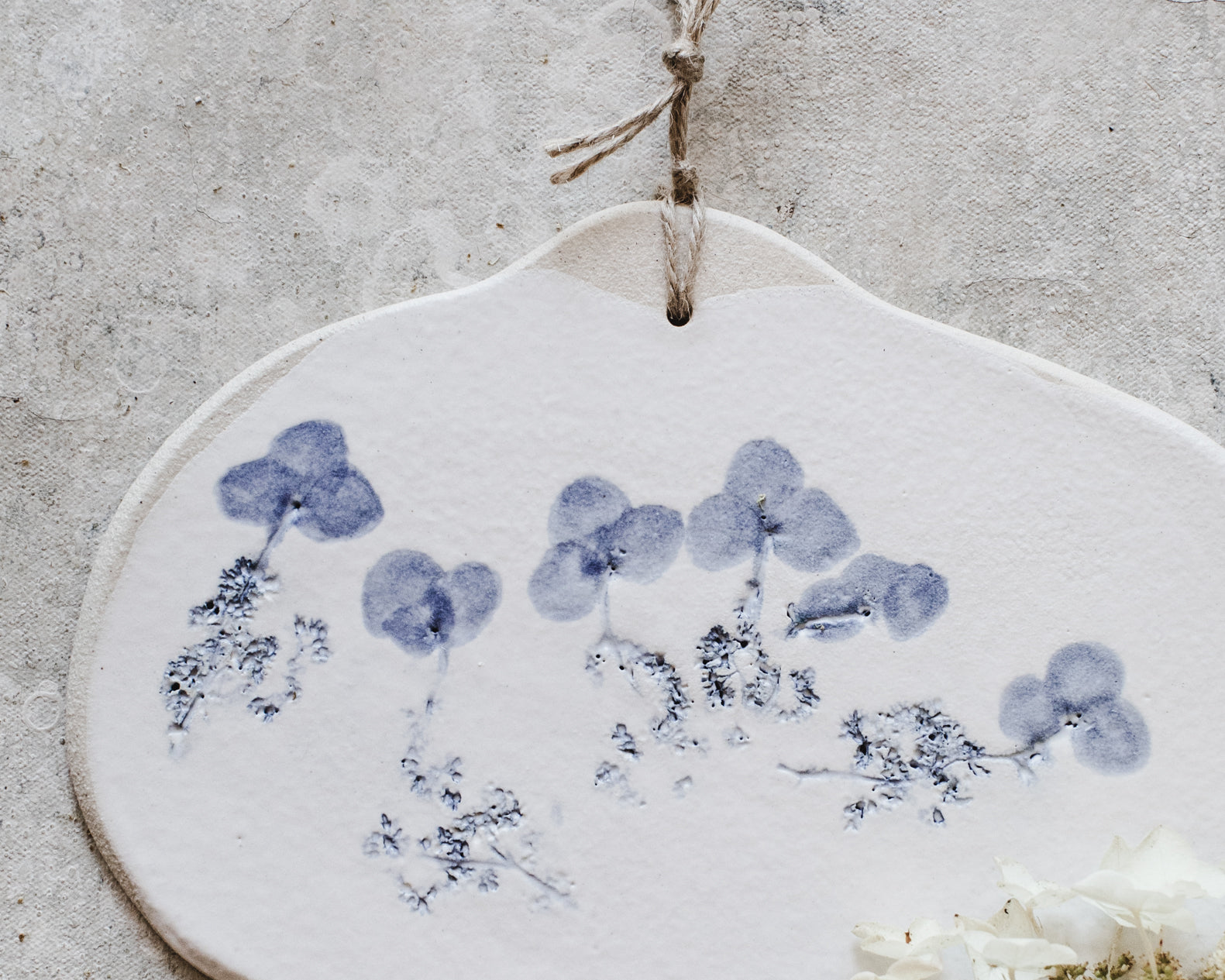 Blue and White organic shaped cheese board with botanical imprint