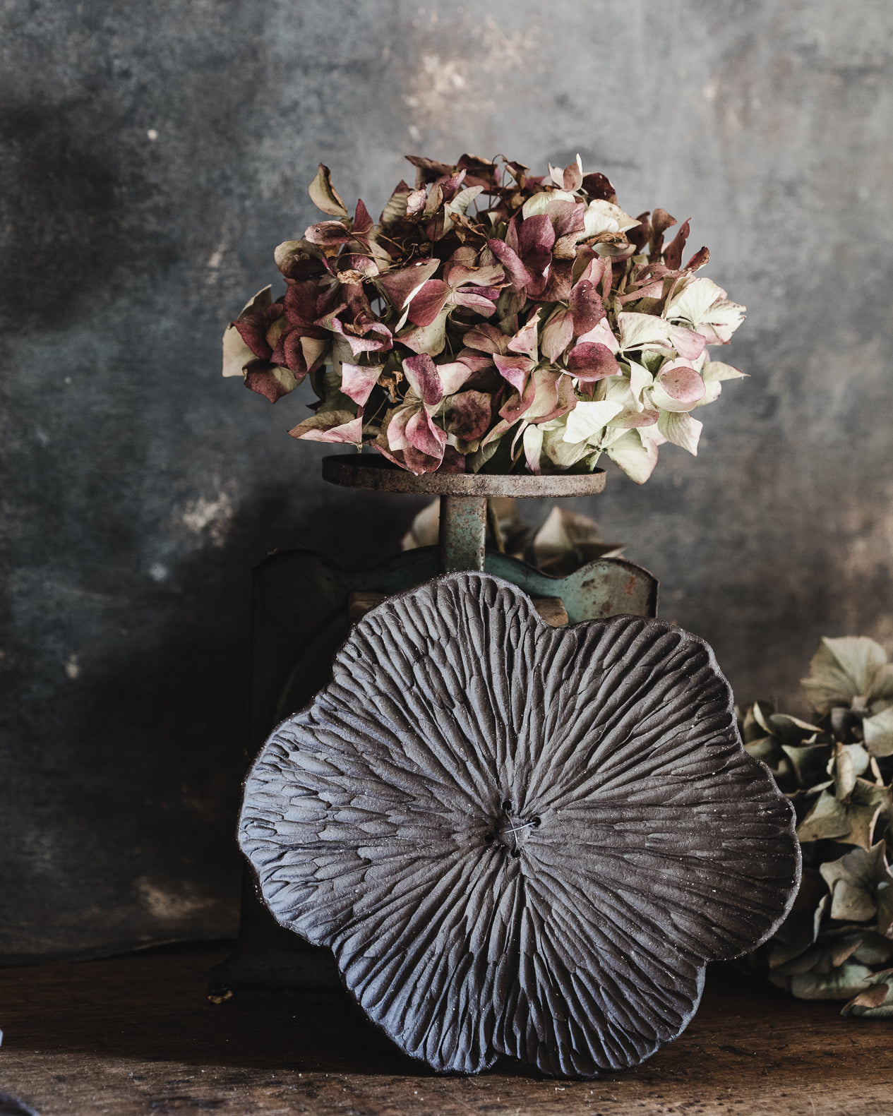 Extra large black flower carved wall art handmade by clay beehive ceramics
