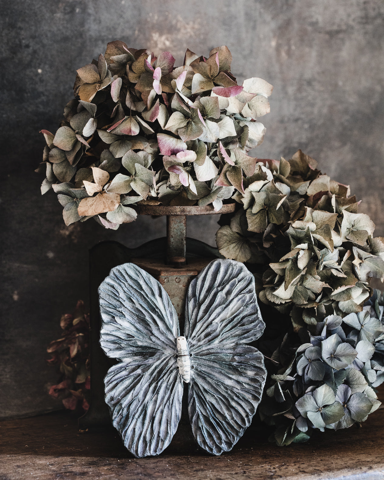 Large Butterfly with carved textured wings in a blue watercolour effect handcrafted by clay beehive ceramics