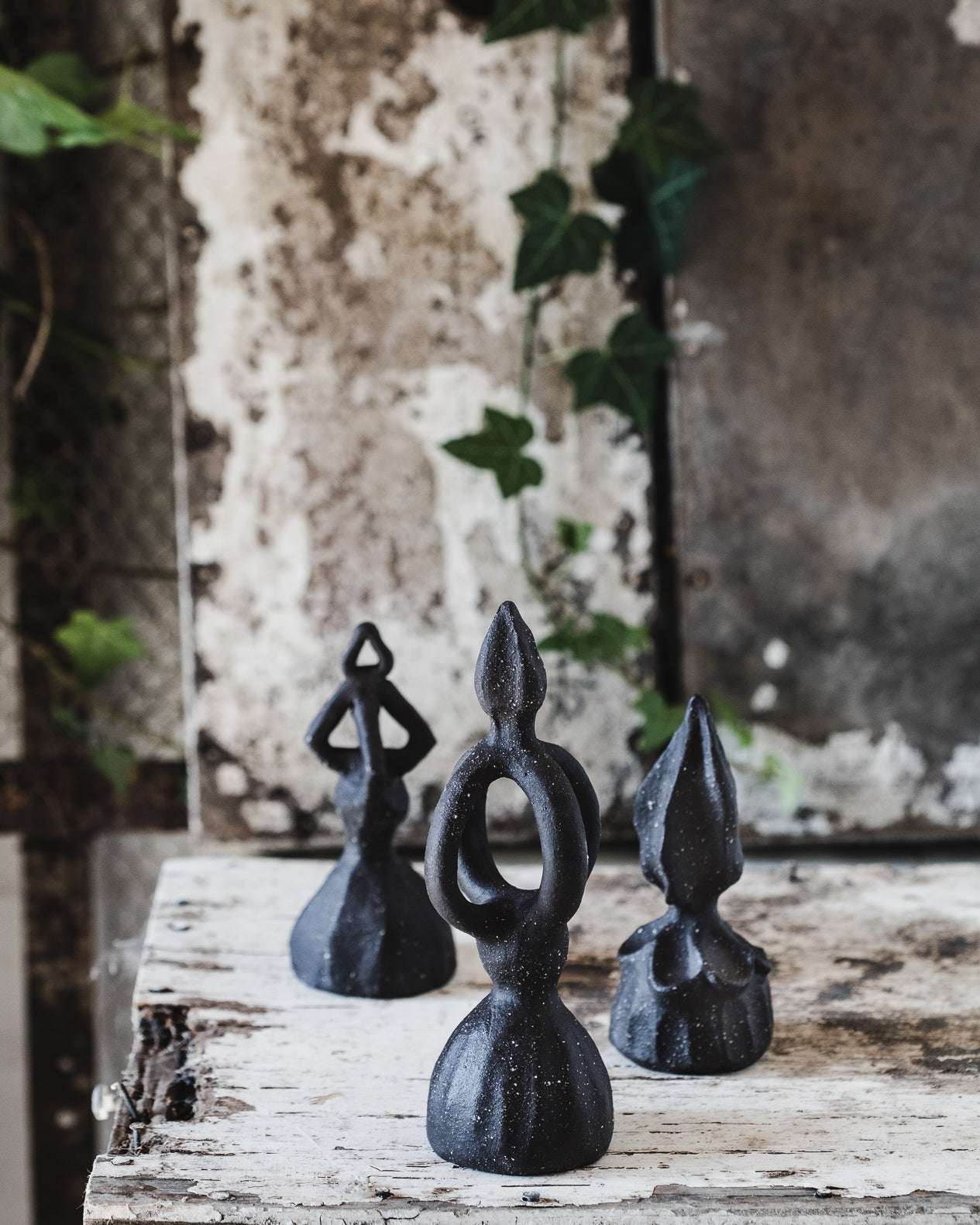 Black ceramic decorative finials for the garden and home interior decor handcrafted by clay beehive ceramics