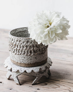 Handmade ceramic cake stand with scalloped rim and crisscrossed feet in white french country style by clay beehive ceramic