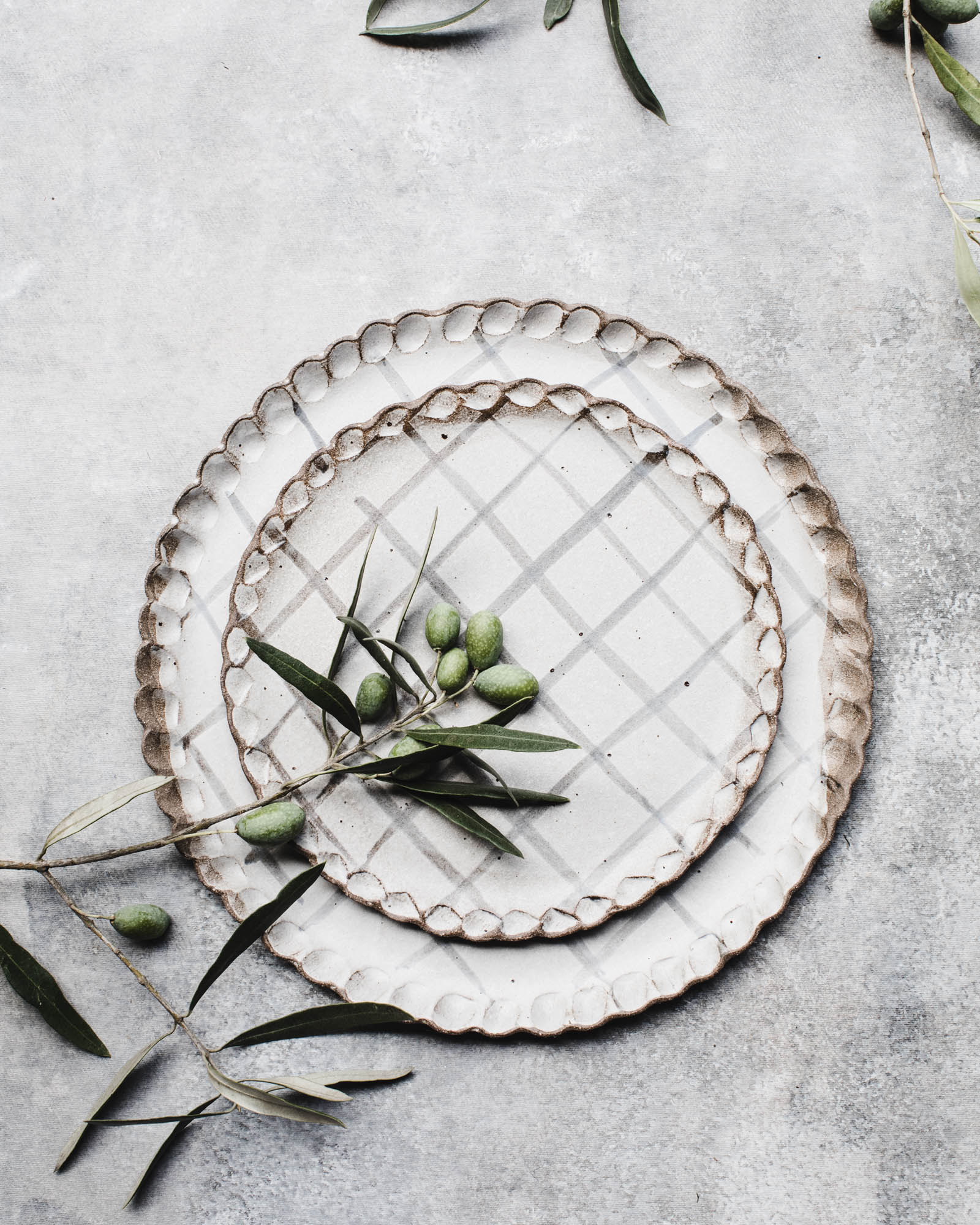 Rustic scalloped rim with tartan brushstroke patterned plates by clay beehive ceramics