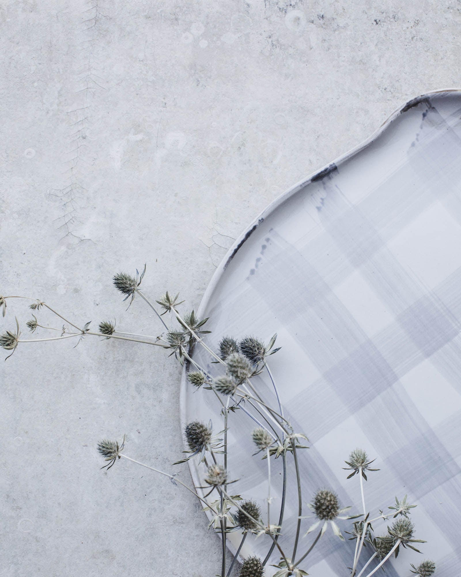 Grey tartan pattern rounded platter with handle handmade by clay beehive ceramics