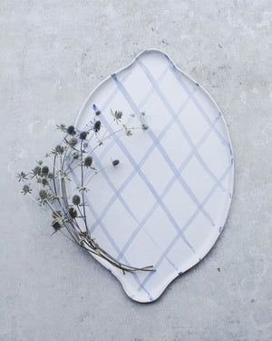 Blue and white platter with handles handmade by clay beehive ceramics