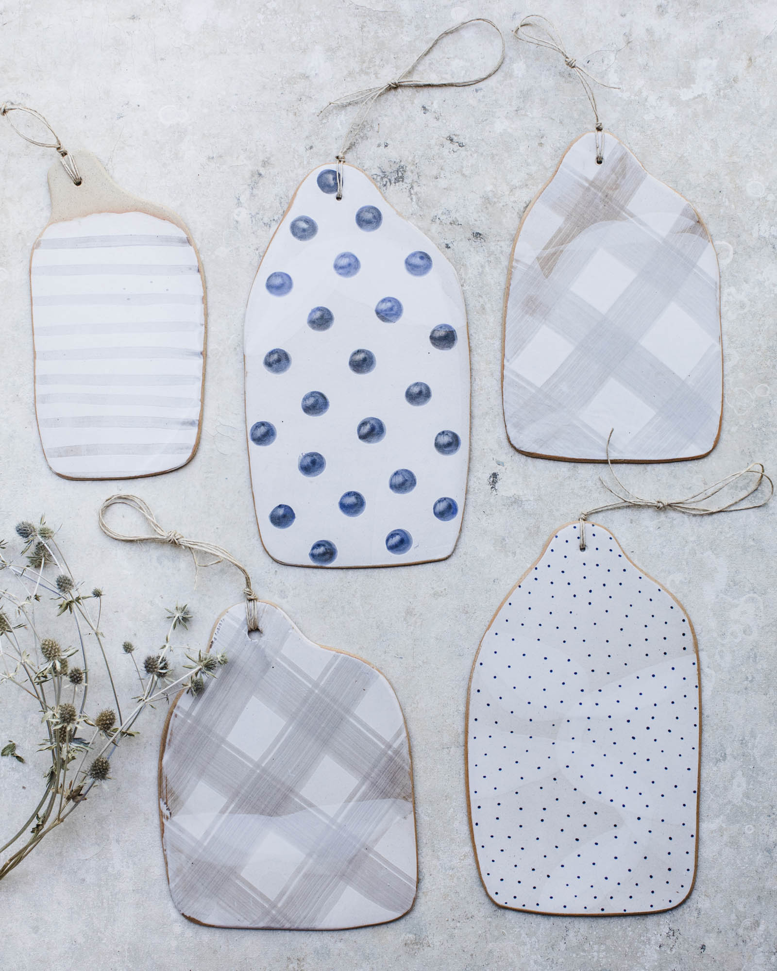 handmade patterned ceramic cheeseboard in tan speckled clay by claybeehive ceramics